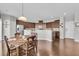 Open kitchen with granite counters, stainless steel appliances, hardwood floors at 9736 Black Willow Ln, Ladson, SC 29456