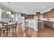 Spacious kitchen with granite counters, island, and stainless steel appliances at 9736 Black Willow Ln, Ladson, SC 29456