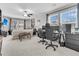 Spacious living room with a sitting area and home office at 9736 Black Willow Ln, Ladson, SC 29456