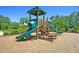 Play area with playset and woodchip surface at 9736 Black Willow Ln, Ladson, SC 29456