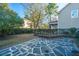 Landscaped backyard with flagstone patio and garden at 101 Ribbon Rd, Summerville, SC 29483