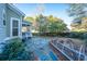 Stone patio, garden, and fenced-in backyard area at 101 Ribbon Rd, Summerville, SC 29483