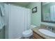 Clean bathroom with shower curtain, granite vanity, and linen towels at 101 Ribbon Rd, Summerville, SC 29483