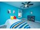 bedroom with twin bed and blue walls at 101 Ribbon Rd, Summerville, SC 29483