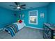 bedroom with twin bed and blue walls at 101 Ribbon Rd, Summerville, SC 29483