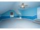 Bright bedroom featuring blue walls, grey carpet, and a ceiling fan at 101 Ribbon Rd, Summerville, SC 29483