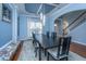 Elegant dining room with a large table and blue walls at 101 Ribbon Rd, Summerville, SC 29483