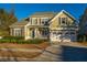 Two-story house with stone accents and a two-car garage at 101 Ribbon Rd, Summerville, SC 29483
