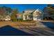 Two-story house with stone accents and a two-car garage at 101 Ribbon Rd, Summerville, SC 29483
