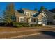 Two-story house with stone accents and a landscaped yard at 101 Ribbon Rd, Summerville, SC 29483