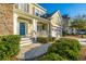 Inviting front porch with rocking chairs and white railings at 101 Ribbon Rd, Summerville, SC 29483