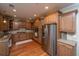 Kitchen boasts wood cabinets, granite counters and stainless steel appliances at 101 Ribbon Rd, Summerville, SC 29483