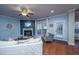 Bright living room features hardwood floors, fireplace, and access to balcony at 101 Ribbon Rd, Summerville, SC 29483