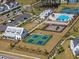 Community overview featuring a pool, playground, pickleball courts, and parking at 1011 Swamp Harrier Ave, Ravenel, SC 29470
