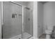 Bathroom with a walk-in shower and toilet at 1011 Swamp Harrier Ave, Ravenel, SC 29470
