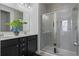 Bathroom with a double vanity and large walk-in shower at 1011 Swamp Harrier Ave, Ravenel, SC 29470