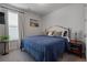 Bedroom with a full-size bed and blue comforter at 1011 Swamp Harrier Ave, Ravenel, SC 29470