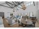 Large clubhouse with high ceilings, chandeliers, and multiple seating areas at 1011 Swamp Harrier Ave, Ravenel, SC 29470