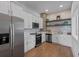 Modern clubhouse kitchen with stainless steel appliances at 1011 Swamp Harrier Ave, Ravenel, SC 29470