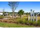 Relaxing community courtyard with colorful seating and landscaping at 1011 Swamp Harrier Ave, Ravenel, SC 29470