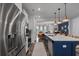 Modern kitchen with stainless steel appliances and white cabinets at 1011 Swamp Harrier Ave, Ravenel, SC 29470