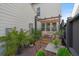 Cozy patio with seating area and brick pavement at 1011 Swamp Harrier Ave, Ravenel, SC 29470