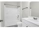 Clean bathroom with white vanity, tub, and shower at 1040 Wading Point Blvd, Huger, SC 29450