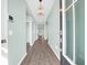 Bright entryway with hardwood floors and a view to the living area at 1040 Wading Point Blvd, Huger, SC 29450