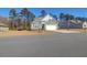 Two-story home with stone and siding at 1040 Wading Point Blvd, Huger, SC 29450