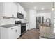 Modern kitchen with stainless steel appliances and granite counters at 1040 Wading Point Blvd, Huger, SC 29450