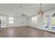 Spacious living area with hardwood floors and access to patio at 1040 Wading Point Blvd, Huger, SC 29450