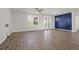 Spacious living area with hardwood floors and access to patio at 1040 Wading Point Blvd, Huger, SC 29450