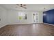 Spacious living room featuring hardwood floors and access to a patio at 1040 Wading Point Blvd, Huger, SC 29450