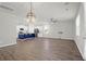 Open living space with hardwood floors and a kitchen view at 1040 Wading Point Blvd, Huger, SC 29450