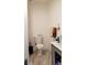 Bathroom with gray vanity and marble-look floor at 12240 Green Pond Hwy, Green Pond, SC 29446