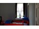bedroom with a unique train bed and window at 12240 Green Pond Hwy, Green Pond, SC 29446