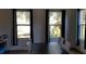 Dining room featuring a dark wood table and windows with black curtains at 12240 Green Pond Hwy, Green Pond, SC 29446
