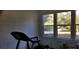 Exercise room with treadmill and window overlooking yard at 12240 Green Pond Hwy, Green Pond, SC 29446