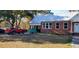 Red truck parked in front of a brick home with a metal roof at 12240 Green Pond Hwy, Green Pond, SC 29446