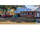 Red truck parked near brick home with metal roof and carport at 12240 Green Pond Hwy, Green Pond, SC 29446