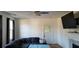 Spacious living room with a sofa, ceiling fan, and a large TV above the fireplace at 12240 Green Pond Hwy, Green Pond, SC 29446