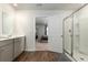 Modern bathroom with double vanity, separate shower, and bedroom access at 135 Sunray Ln, Summerville, SC 29486