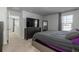 Large bedroom with a king-size bed, TV, and built-in wardrobe at 135 Sunray Ln, Summerville, SC 29486