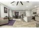 Open concept kitchen with gray cabinets, granite countertops, and stainless steel appliances at 135 Sunray Ln, Summerville, SC 29486