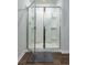 Clean shower with glass enclosure and built-in shelves at 135 Sunray Ln, Summerville, SC 29486
