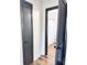 Bathroom with dark doors and a view of the tub and shower at 202 Briarwood St, Walterboro, SC 29488