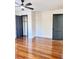Hardwood floor bedroom with closet and ceiling fan at 202 Briarwood St, Walterboro, SC 29488