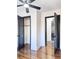 Bedroom with hardwood floors, ceiling fan and closet at 202 Briarwood St, Walterboro, SC 29488