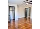 Bedroom with hardwood floors, ceiling fan and closet at 202 Briarwood St, Walterboro, SC 29488