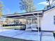 Covered carport next to the house's front porch at 202 Briarwood St, Walterboro, SC 29488